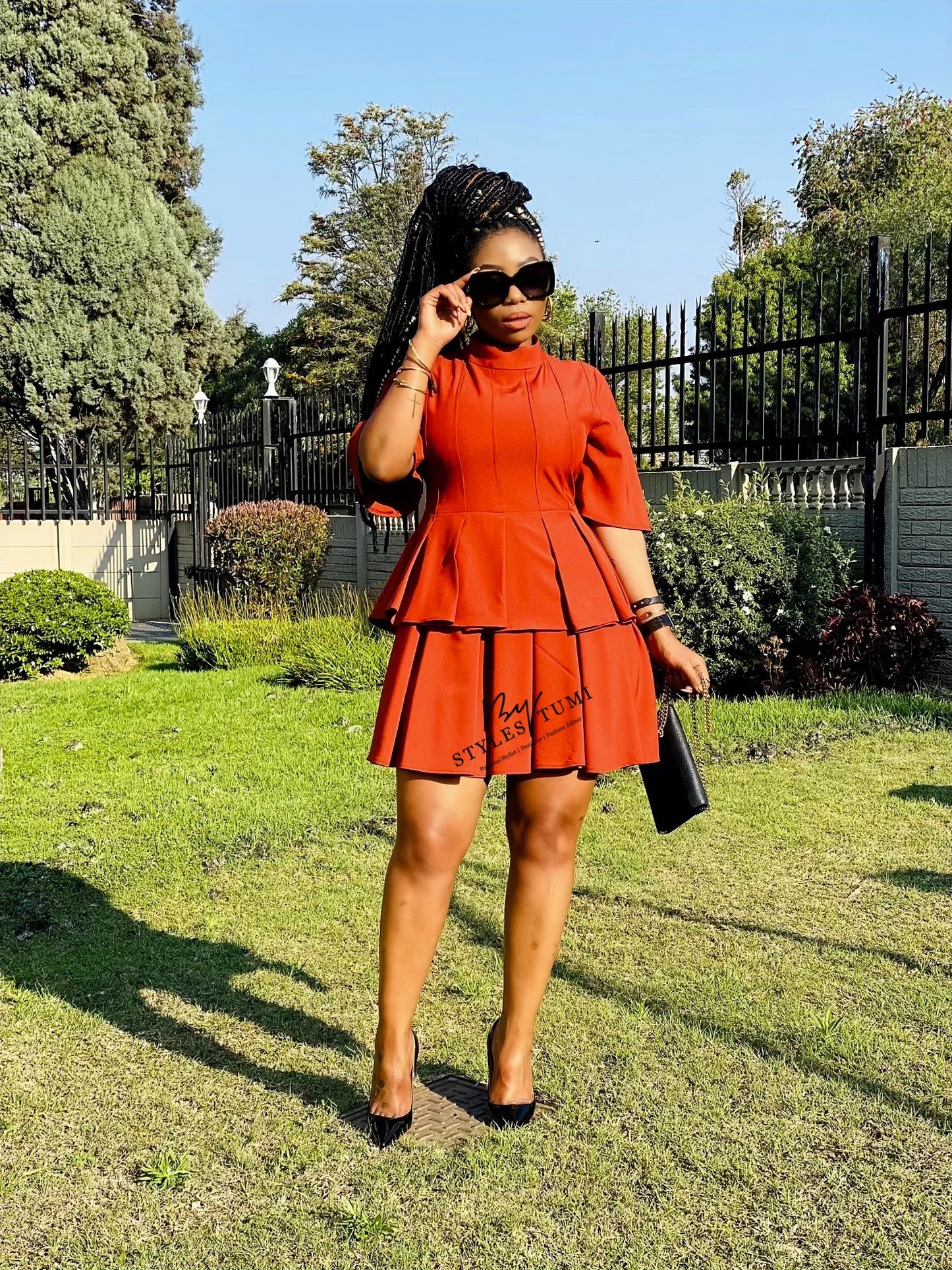 Pleated peplum dress