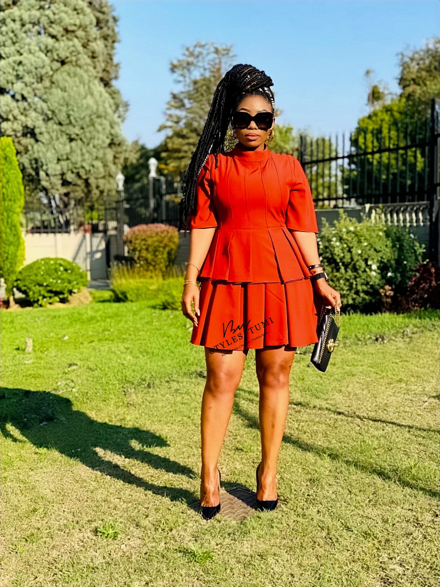 Pleated peplum dress