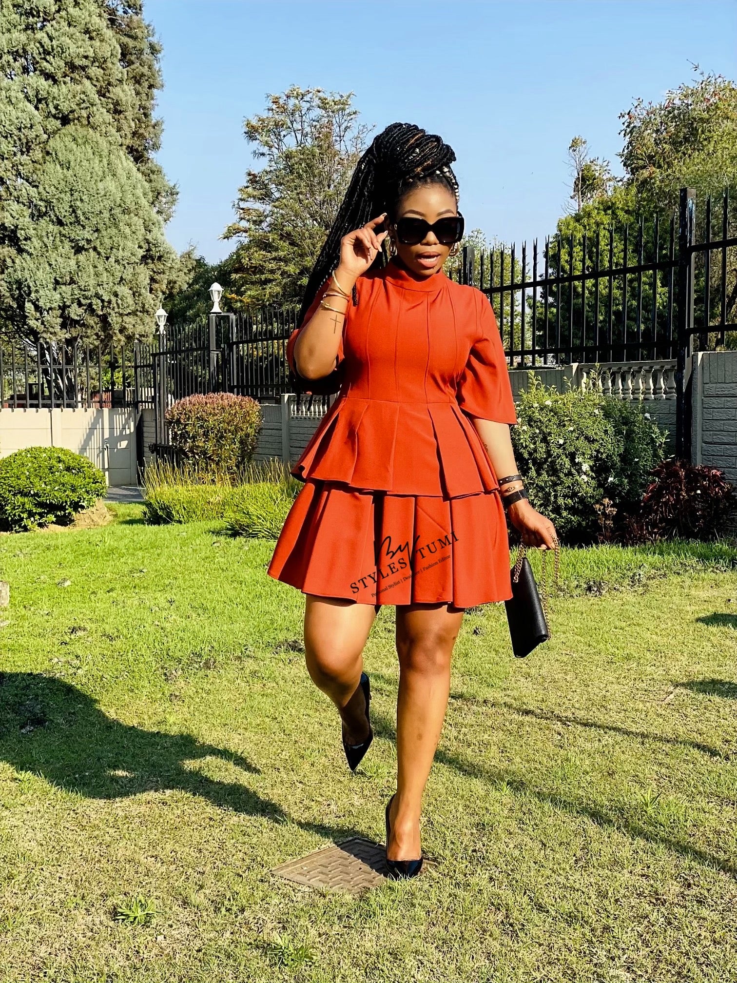 Pleated peplum dress