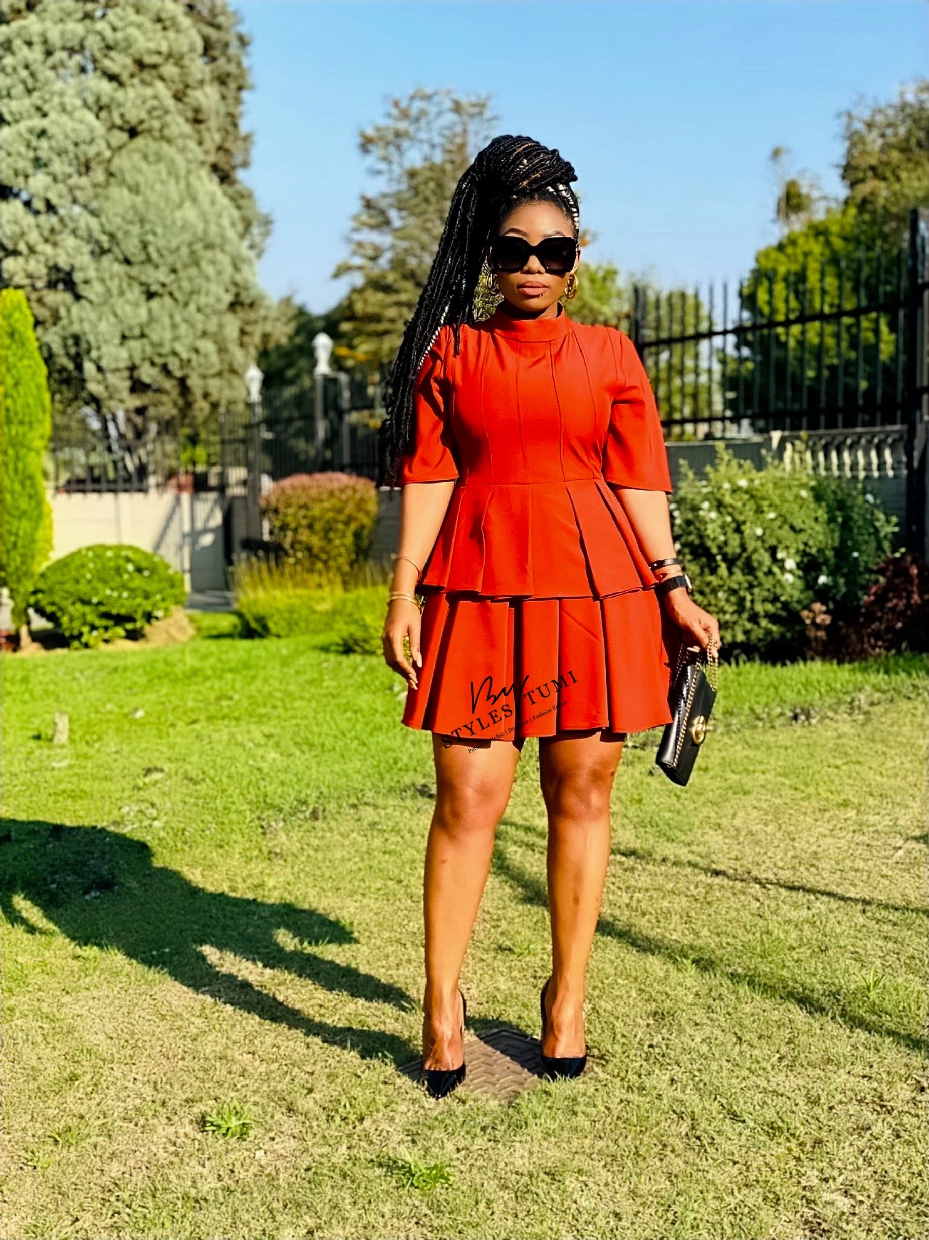 Pleated peplum dress