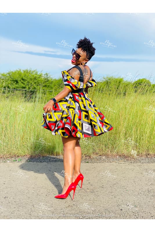 multi coloured off shoulder African flare dress Styles By Tumi